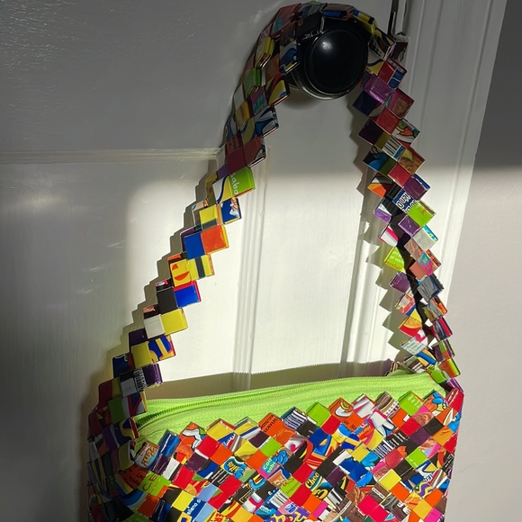 Fun label wrapper handbag. New without tags. Never used. Zipper - Picture 3 of 3